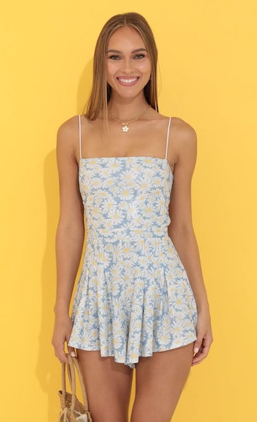Lucy in the Sky's Bella Floral Pleated Romper in pastel colors with sunflowers.